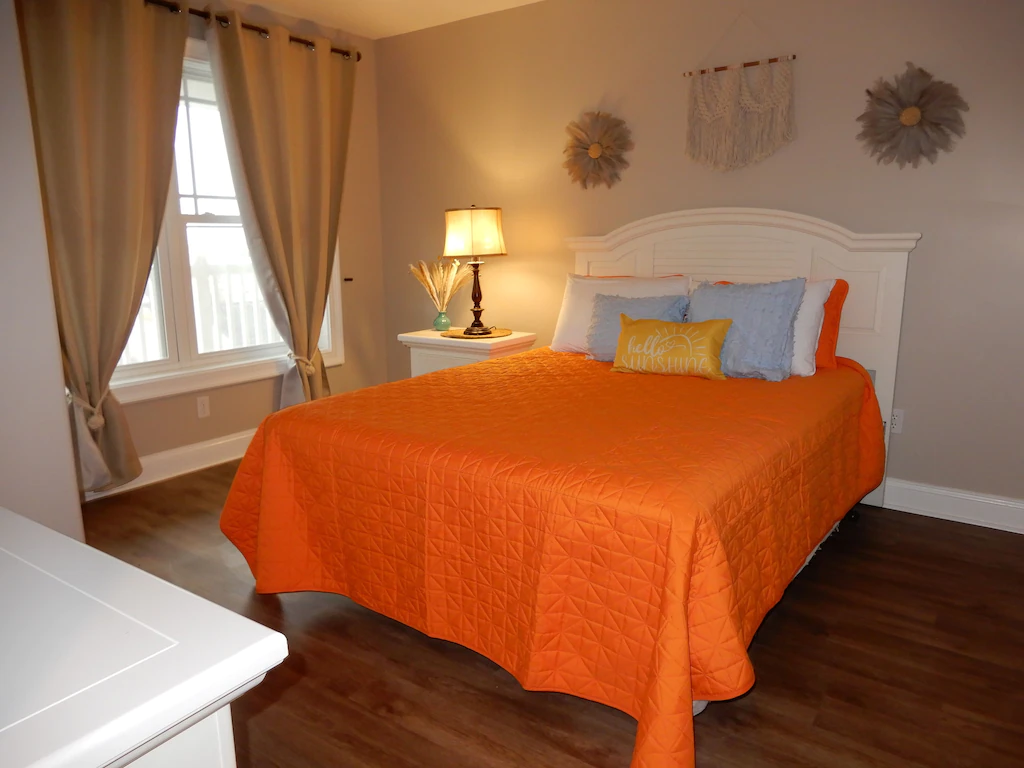 Gone Coastal front bedroom with queen bed